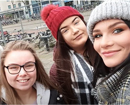 group of three girls smiling