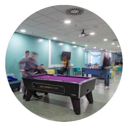 Girl smiling holding sign