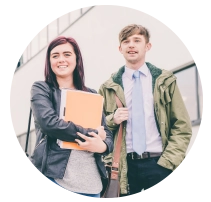 girl smiling in front of Belfast Met campus (1)